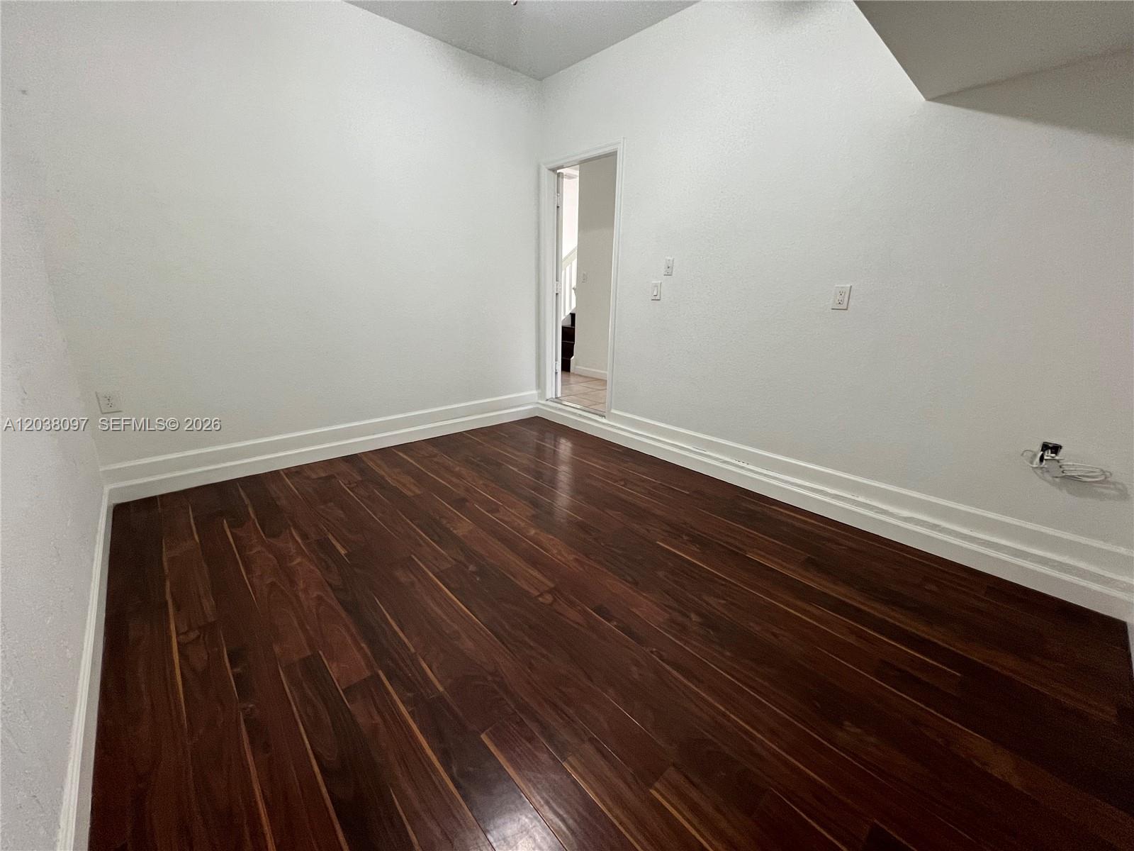 Coral Lakes Kingdom townhouse — third bedroom with wood floors — 2555 SW 147th Path Miami FL 33185