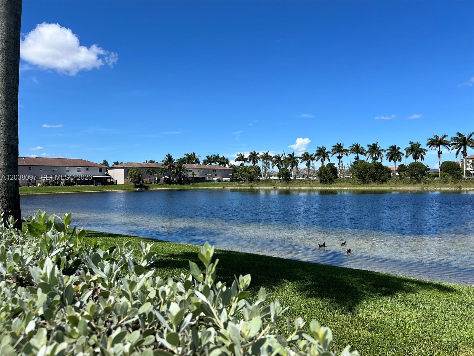 Coral Lakes Kingdom townhouse — freshly painted exterior and driveway — 2555 SW 147th Path Miami FL 33185