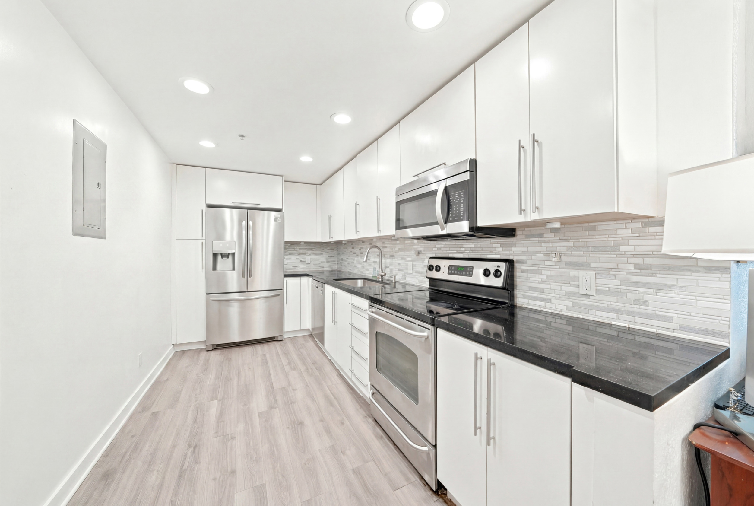 Treasures on the Bay II — full bathroom with modern finishes — 7501 E Treasure Dr #2S North Bay Village FL