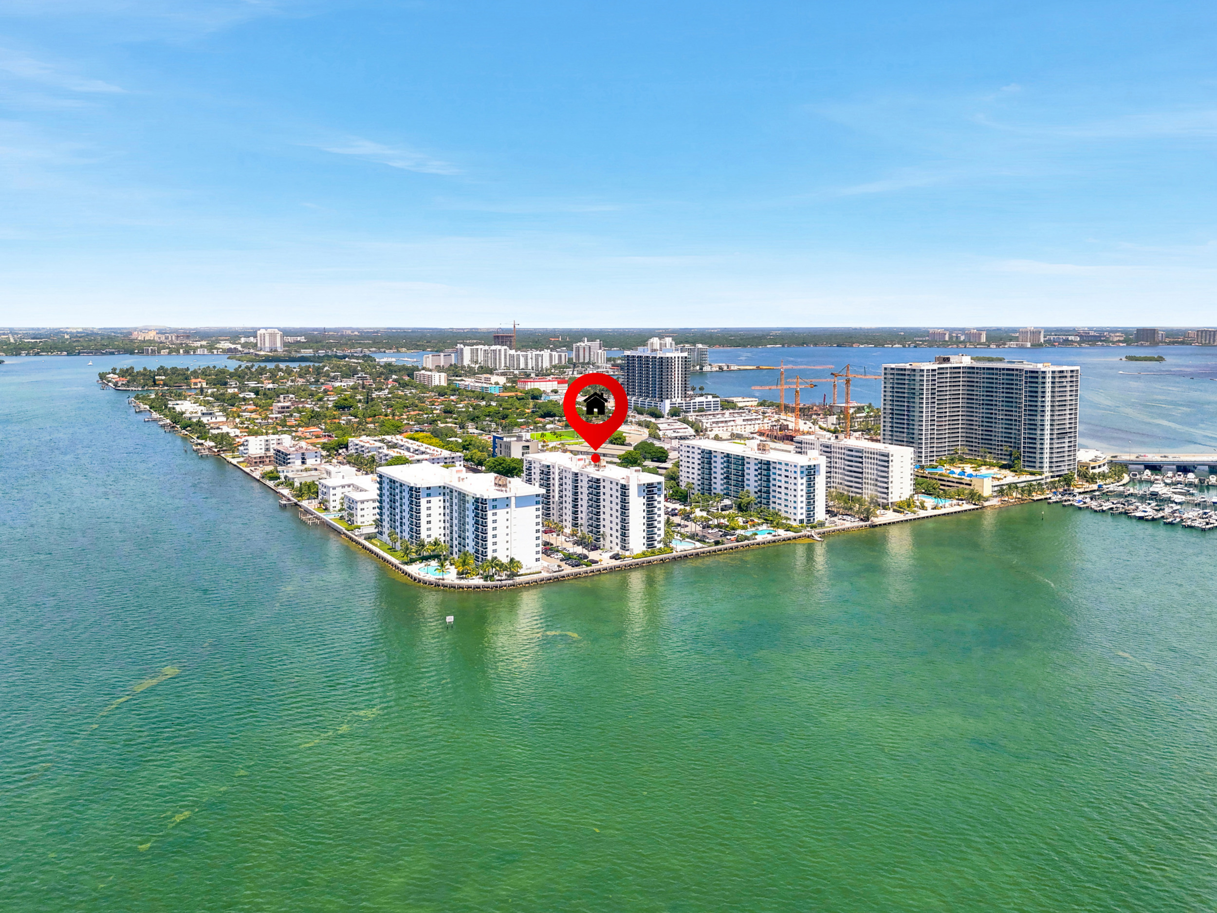 Treasures on the Bay II — building facade from street — 7501 E Treasure Dr #2S North Bay Village FL