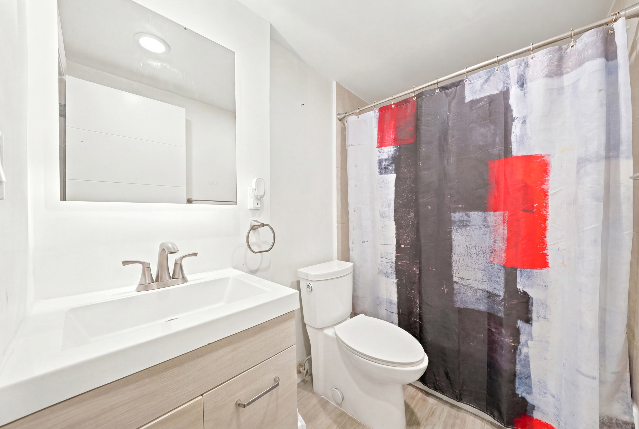 Treasures on the Bay II — aerial neighborhood view and Biscayne Bay — 7501 E Treasure Dr #2S North Bay Village FL